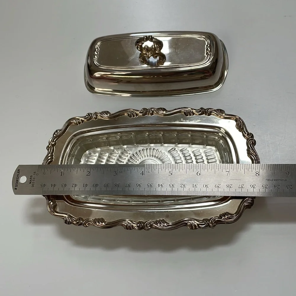 William A Rogers set of silver-plated gravy boat, butter‎ dish, & platter.